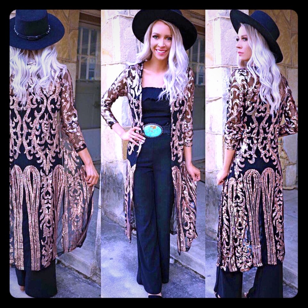 Sequence duster and Stetson velvet black jumpsuit.